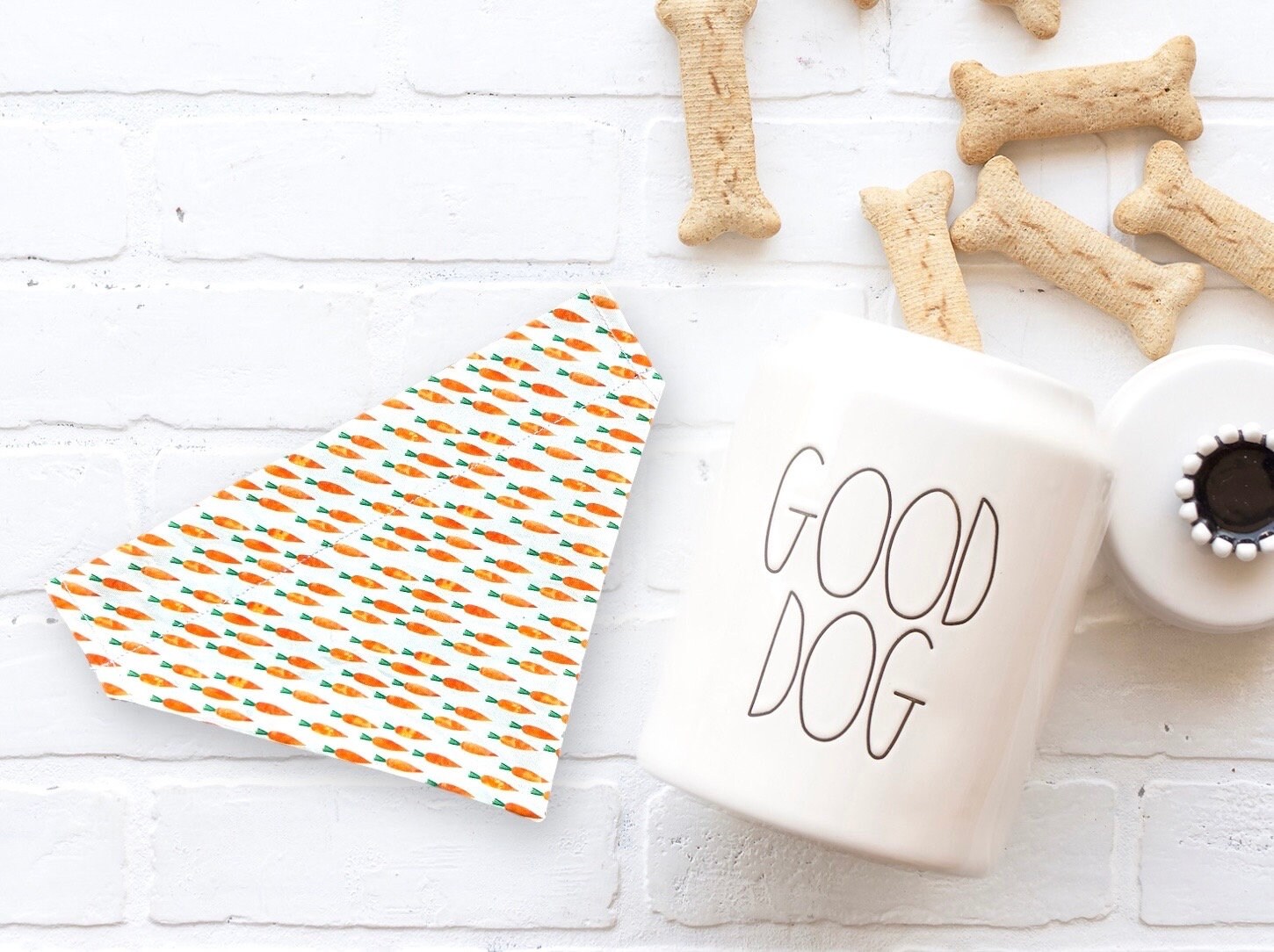 a cup of coffee next to some dog bones