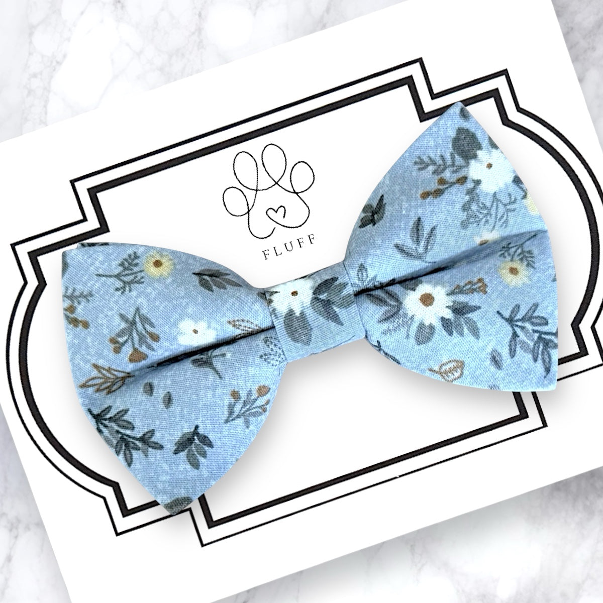 Light blue dog bow tie with white flowers