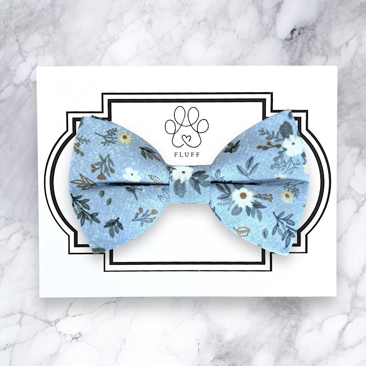 Light blue bow tie with white flowers