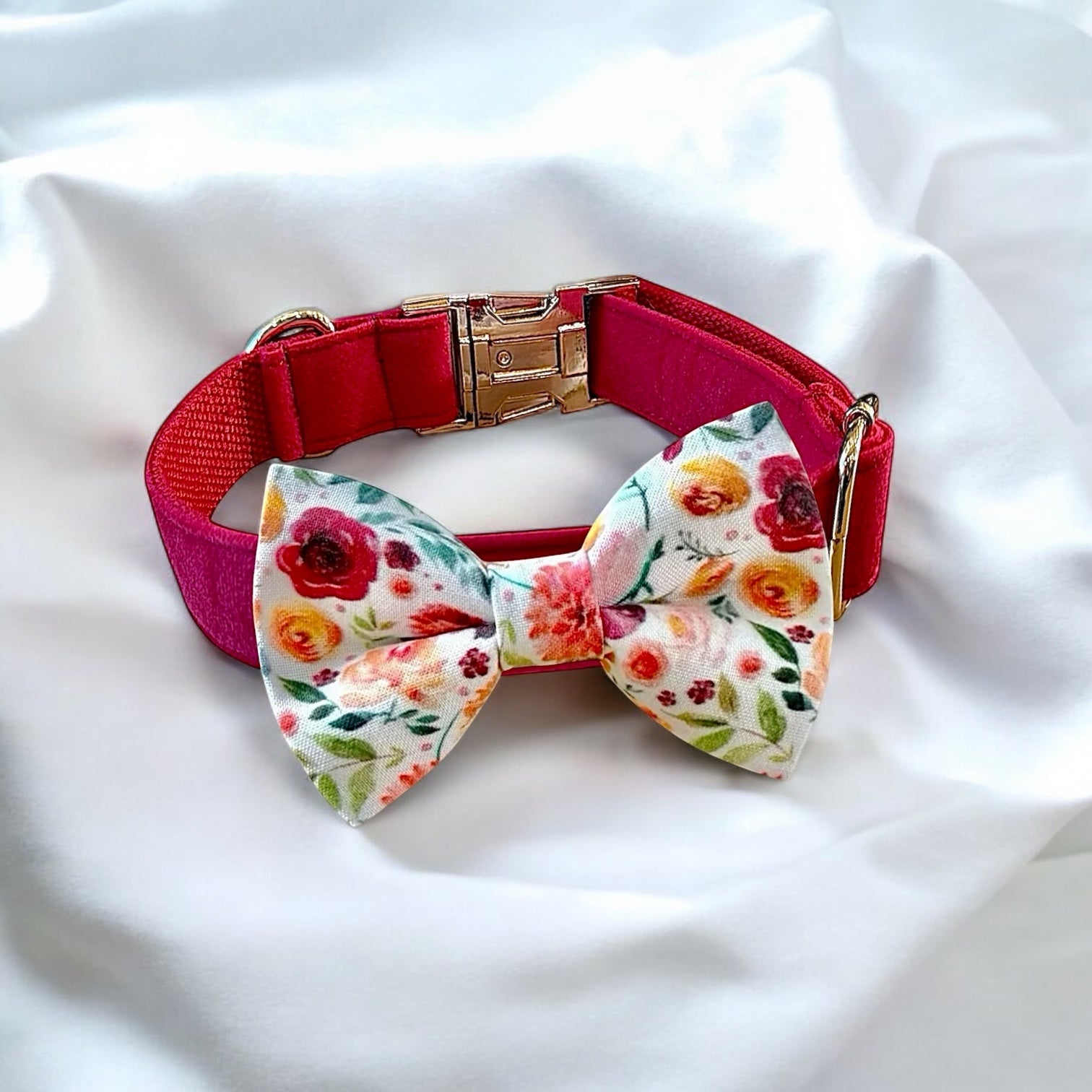 Dog collar with a floral bow tie on a white background