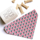 a pink tie with a dog bone on it